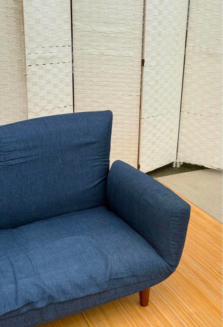 BLUE LOW SOFABED IN GOOD CONDITION (Category: Sofas) located in Manila. Submitted by jerichocal17856 (Listing ID 1454242322, Image 3). Description: JAPAN SURPLUS BLUE LOW SOFABED IN GOOD CONDITION SIZE: 12H x 55-64.5L x 22-46L W inches.