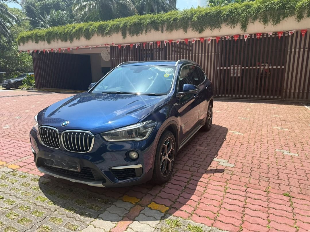 BMW X1 sDrive18i (A) (Category: Used Cars) located in Singapore. Submitted by nick_pree (Listing ID 1454260767, Image 2). Description: 🔥 DIRECT OWNER SALE – IMMACULATE 2018 BMW X1 🔥 Key Details: • Registration Date: May 2018 • Current Mileage: 71,350 only (~8,700 km/year – very low usage!) • Owner: Direct Owner (Careful, non-smoker user) • History: 100% Accident-Free, No Dents, No Scratches Maintenance & Condition: • Full Service History: maint