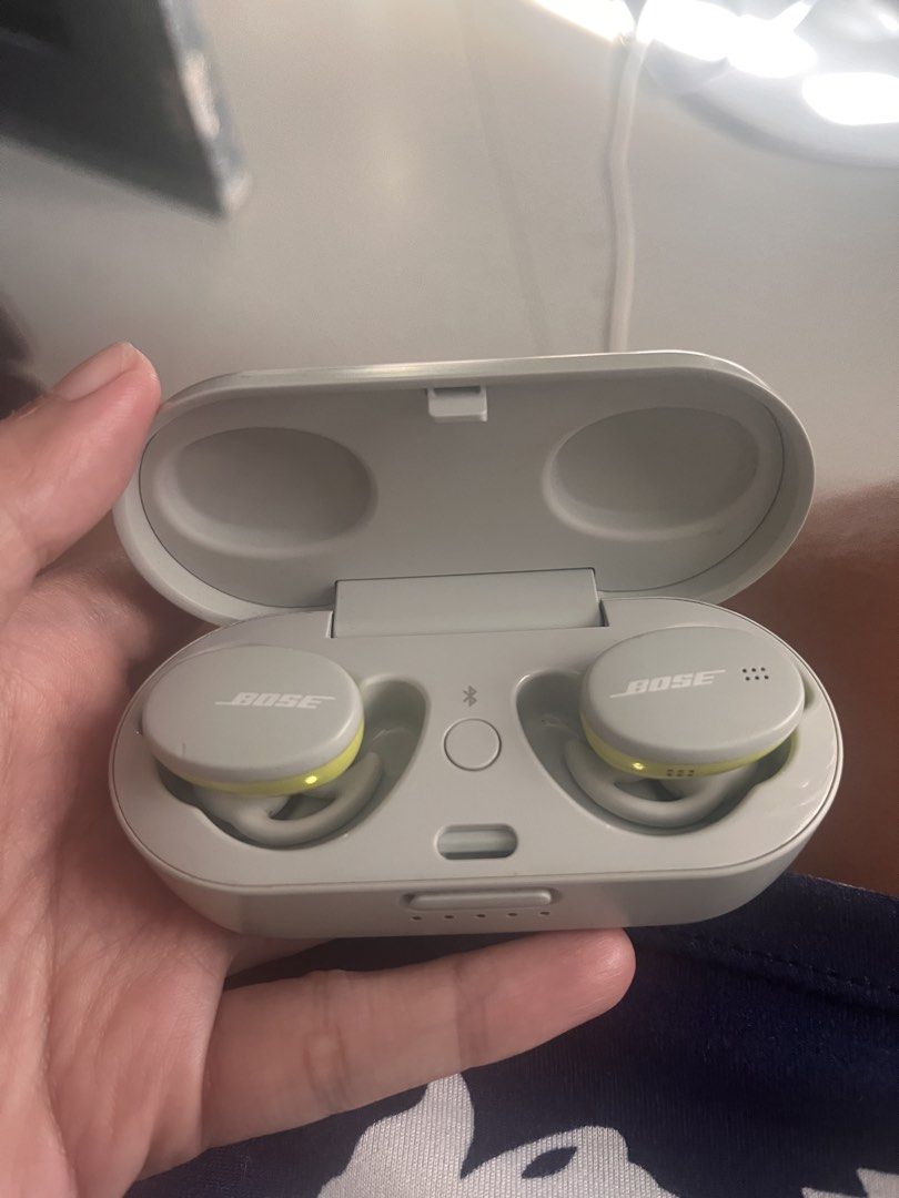 Bose Wireless Earbuds with Charging Case (Category: Earphones) located in Cebu City. Submitted by vodchi_store (Listing ID 1454302241, Image 1). Description: - Bose wireless earbuds - Includes charging case - Distinctive yellow accents on earbuds - Charging indicator lights for easy monitoring - Superior sound quality by Bose - Ideal for workouts and daily commutes.