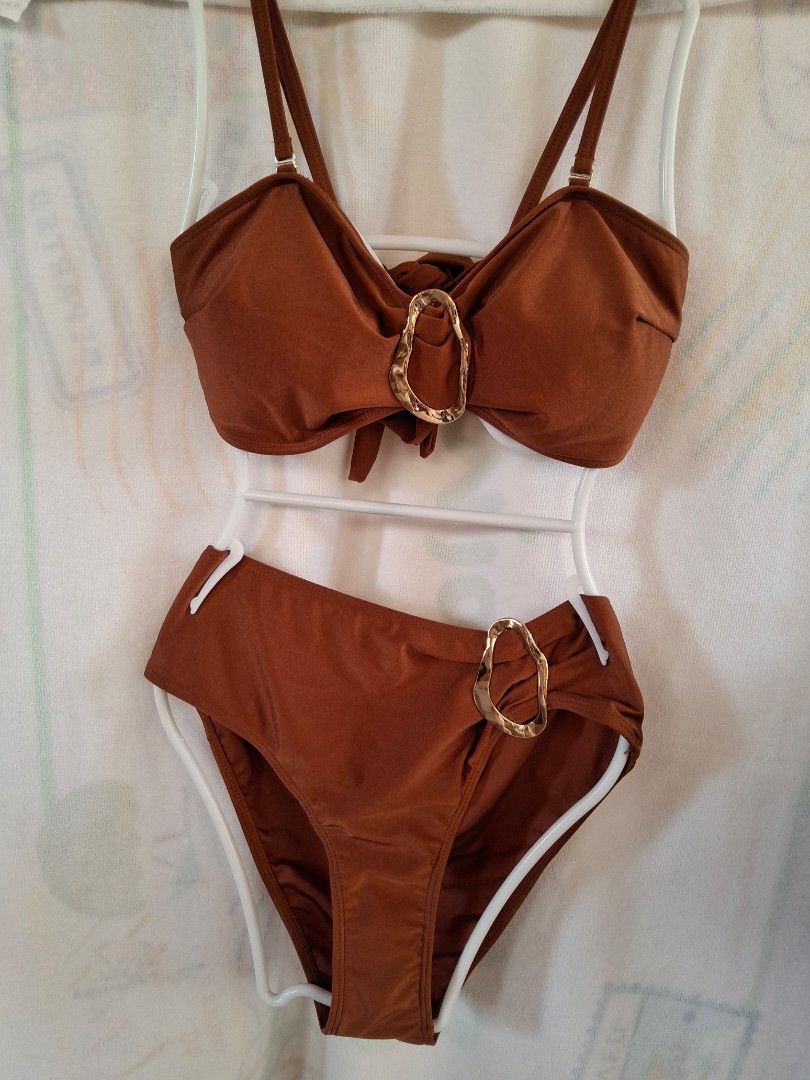 Brown Bikini Set with Gold Hardware (Category: Bikinis & Swimsuits) located in Batangas. Submitted by mi07d (Listing ID 1454234994, Image 1). Description: - Cute brown bikini set - Features gold ring detail on top and bottoms - Ties at the neck and back for adjustable fit - Classic cut bottoms - Ideal for beach or pool days.