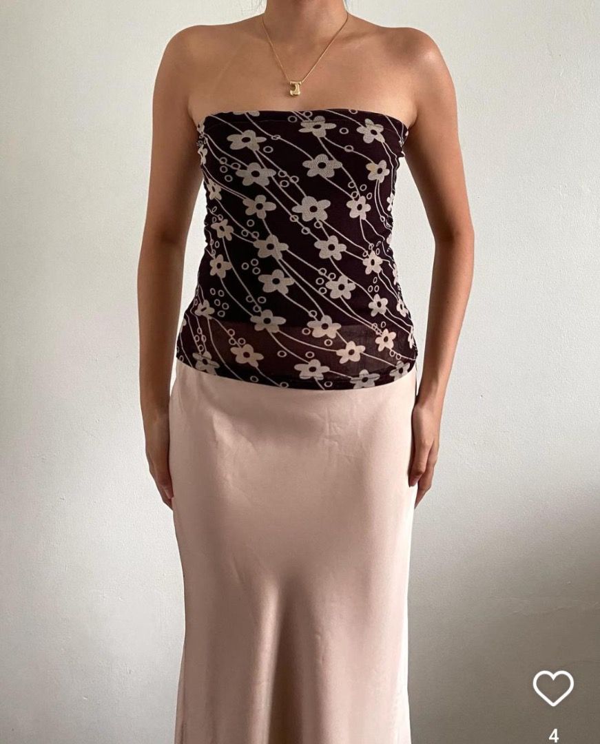 Brown Floral Mesh Tube Top (Category: Others Tops) located in Quezon City. Submitted by shoegaysdevourer (Listing ID 1454354563, Image 1). Description: - Cute brown mesh tube top - Features a white floral pattern - Stretchy material for a comfortable fit - Perfect for pairing with skirts or jeans - Ideal for casual day outs or nights out.
