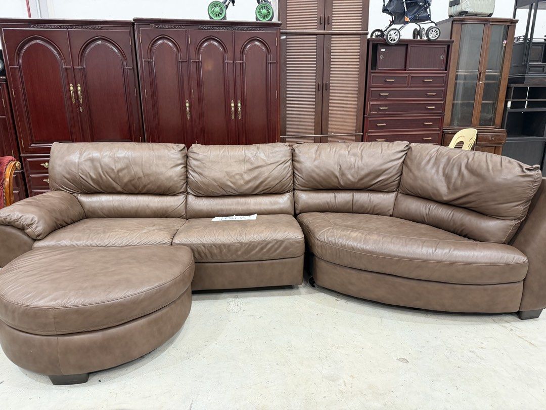 Brown Leather Sectional Sofa with Ottoman - Made in Italy (Category: Sofas) located in Manila. Submitted by furnitured (Listing ID 1454209331, Image 2). Description: - Comfortable brown leather sectional sofa - Includes matching ottoman - Made in Italy - Ideal for living rooms or lounges - Plenty of seating space - Soft and durable leather - Ready for a new home.