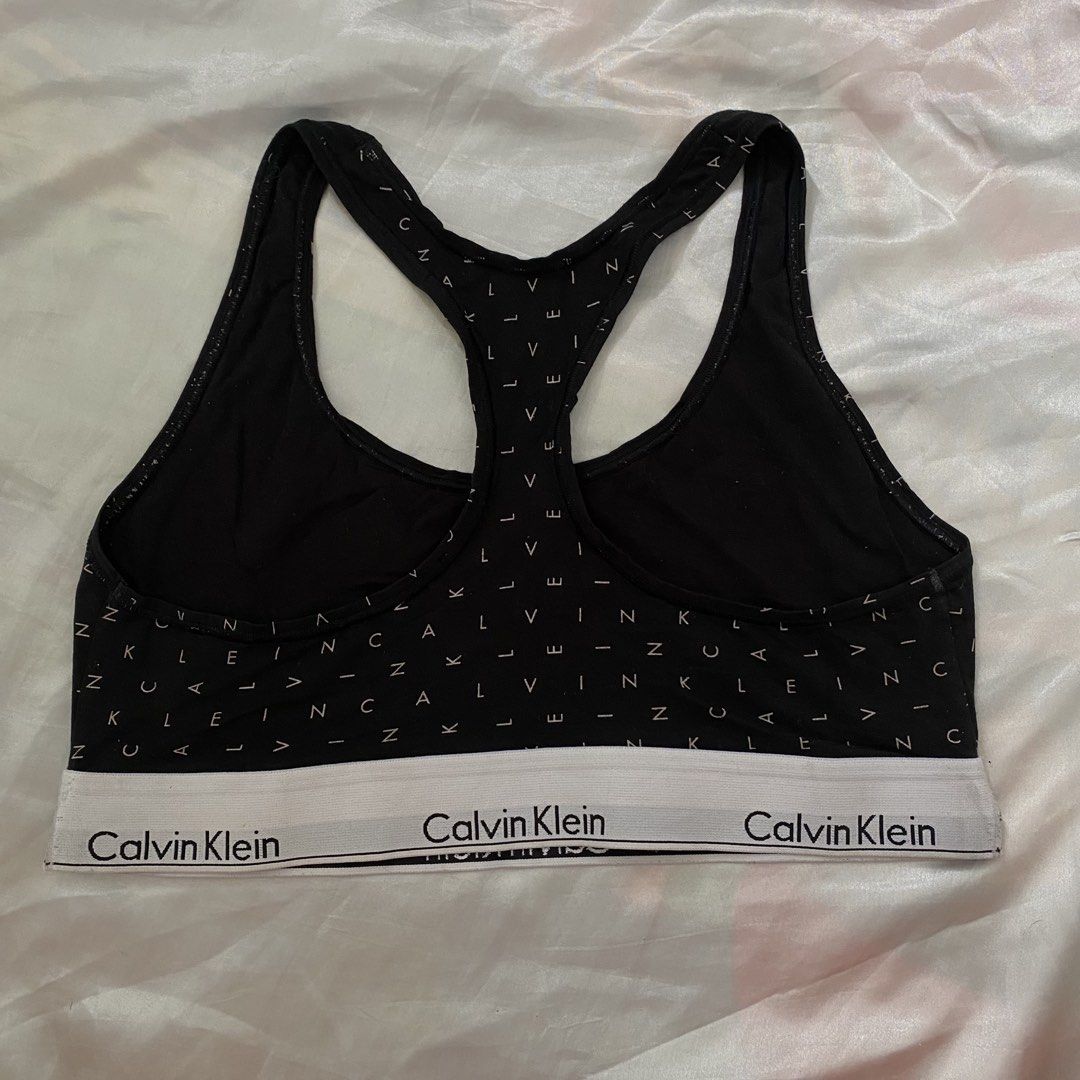 CALVIN KLEIN SPORTBRA TOP (Category: Activewear) located in San Carlos. Submitted by finest_selection (Listing ID 1454258170, Image 2). Description: CALVIN KLEIN SPORTBRA TOP Black L on tag 36-40 Super like new; AOP.