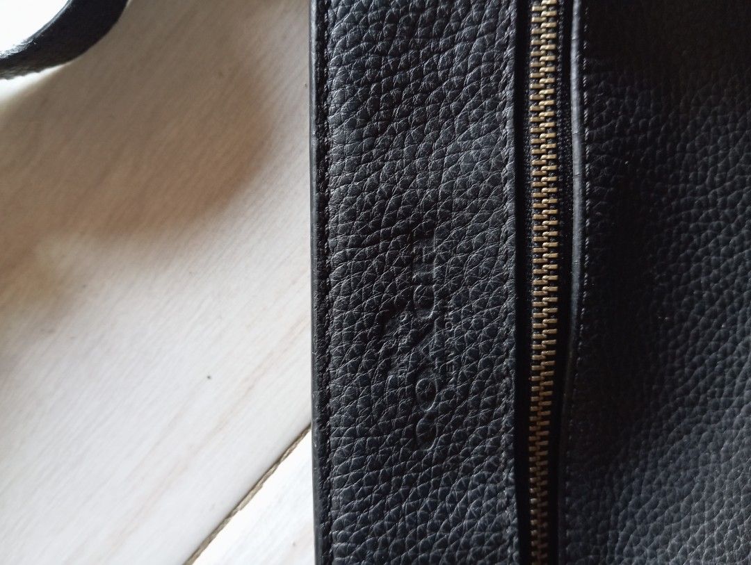 Coach Black Leather Crossbody Bag (Category: Cross-body Bags) located in Manila. Submitted by jzk25 (Listing ID 1454188256, Image 2). Description: - Genuine black leather crossbody bag - Features a convenient front zip pocket - Spacious main compartment for essentials - Adjustable strap for comfortable wear - Durable metal hardware - Note: Slight signs of wear on strap attachments - Interior is clean and well-maintained - Ideal for everyday use a