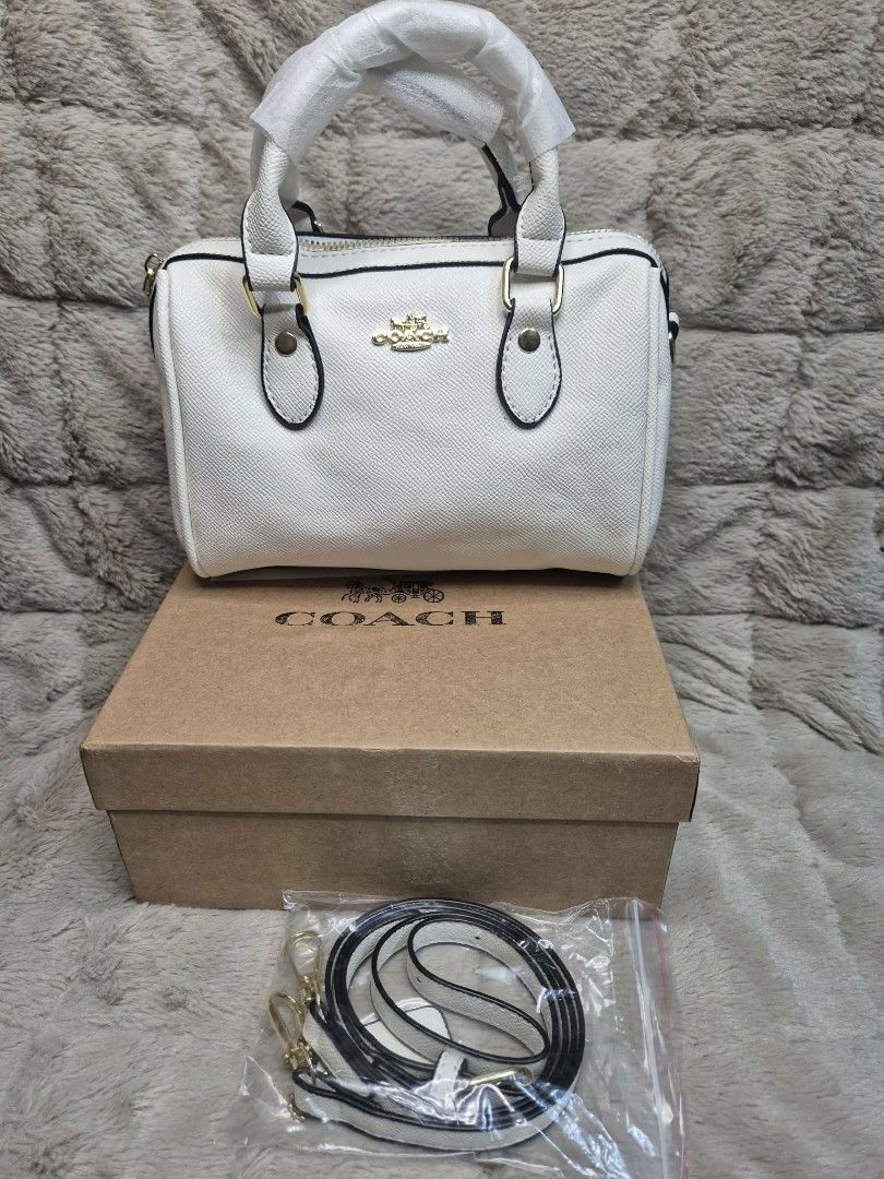 Coach Monogram Mini Barrel Bag with Box (Category: Luxury Bags & Wallets) located in Manila. Submitted by mysticfox.9b1678 (Listing ID 1454248454, Image 2). Description: - Coach mini barrel bag - Available in beige monogram or white - Comes with original box and dust bag - Detachable strap included - Ideal size for essentials - Perfect for everyday use or a night out.