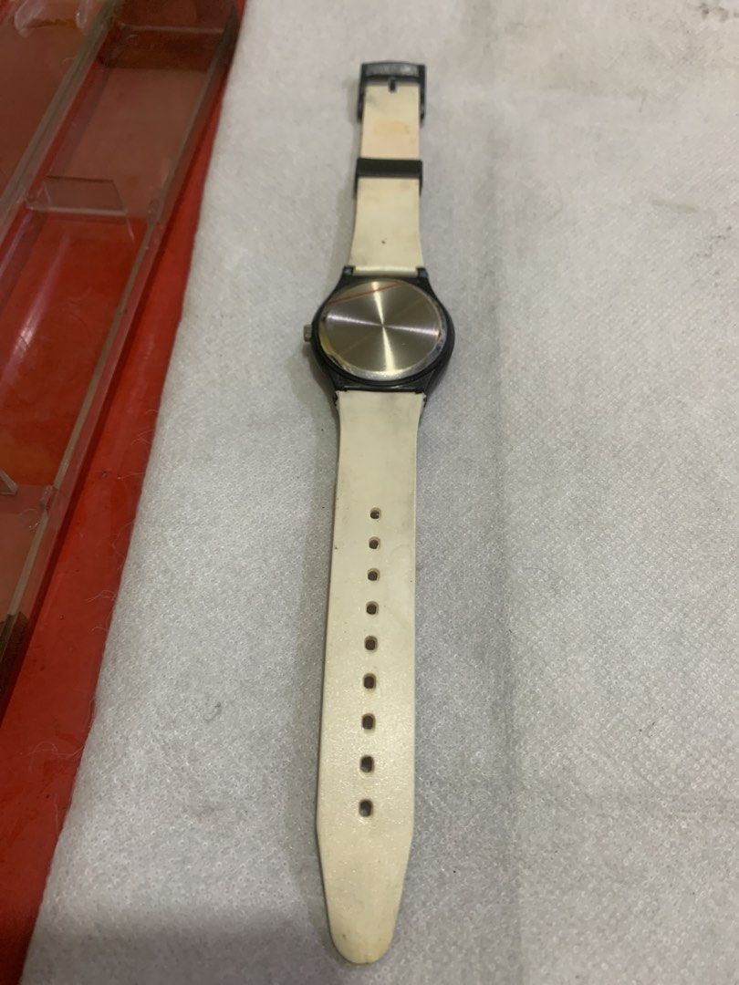 Coca-Cola Swatch Watch - Colorful Strap (Category: Men's Watches) located in Antipolo. Submitted by cebb888 (Listing ID 1454202491, Image 3). Description: - Vintage Coca-Cola watch - Vibrant, colorful strap with Coca-Cola logo - Yellow sunburst watch face with Coca-Cola branding - Perfect collectible for Coca-Cola enthusiasts - Adjustable strap -where is as is . -collectible item only .