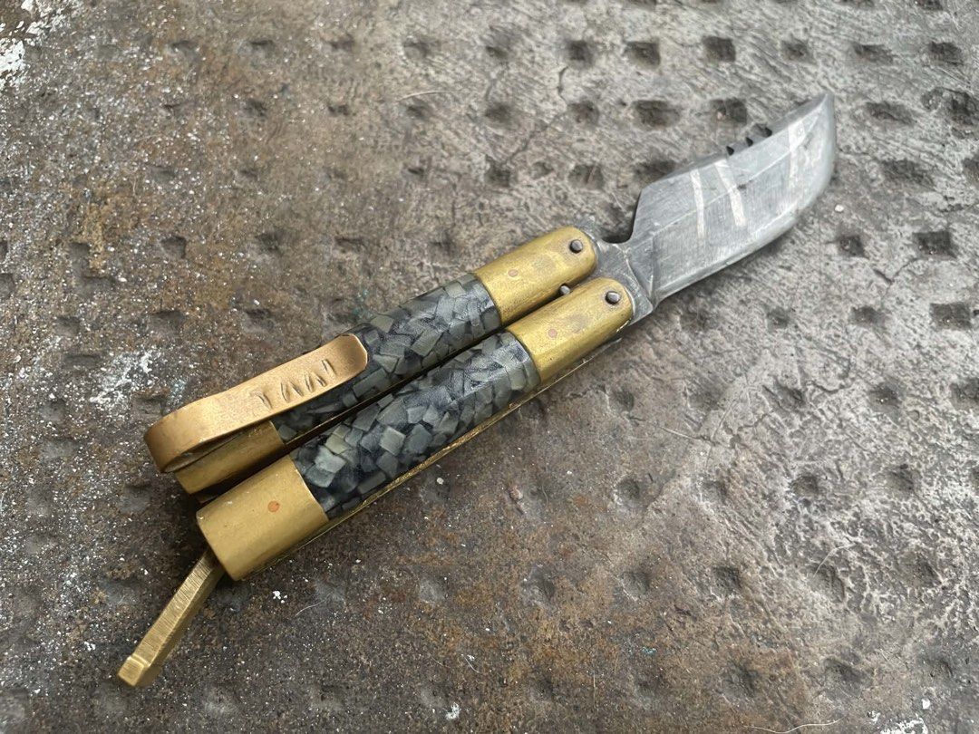 Collectible Glow Balisong custom (Category: Knives & Chopping Boards) located in Quezon City. Submitted by younik_finds (Listing ID 1454275566, Image 3). Description: Shredded Glow Scale Balisong Custom! Customized for collectors only. Glow in the dark. Bead NOT included.