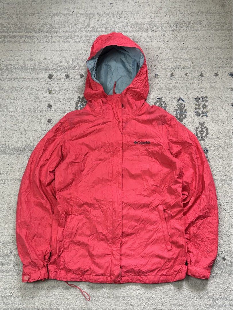 Columbia Packable Rain Jacket - Red (Category: Coats, Jackets and Outerwear) located in Daet. Submitted by thrifthings2018 (Listing ID 1454199687, Image 2). Description: - Columbia packable rain jacket in vibrant red. - Ultra-lightweight and easy to pack for on-the-go. - Features a protective hood and adjustable drawstring hem. - Ideal for unexpected downpours or outdoor excursions. - Measurements: Width 21 inches, Length 26 inches..