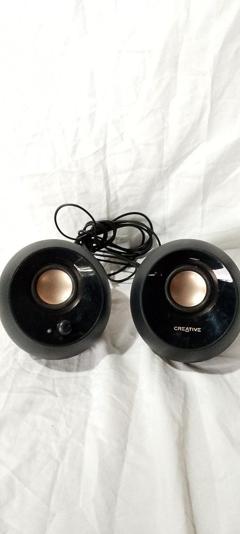 Creative Computer Speakers MP300 (Category: Soundbars, Speakers & Amplifiers) located in Quezon City. Submitted by jpnvintageonline (Listing ID 1454325139, Image 1). Description: - Creative MP300 computer speakers - Stylish black with gold accents - Convenient front volume knob - Perfect for desktop or laptop audio - Tested and confirmed working - Minor scuffs from normal use.