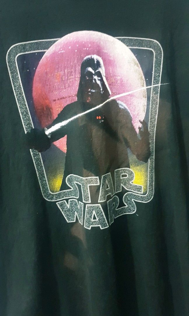 Darth Vader (Category: Tshirts & Polo Shirts ) located in Taguig. Submitted by thriftedminds (Listing ID 1454338314, Image 2). Description: Item: Darth Vader🔥 Size: OPT Funko (XL) Width: 23.5 Length: 30.5 Condition: Good Issue: Uneven Faded on shirts DM to purchase 📩.