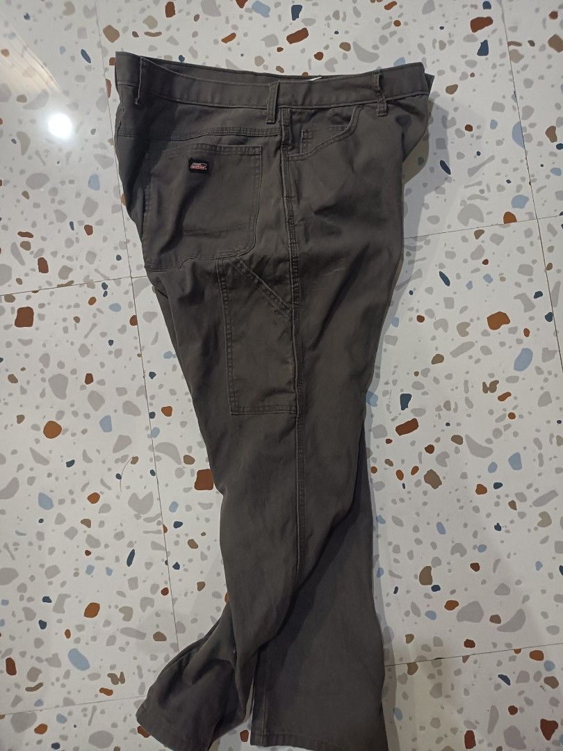 Dickies Work Pants Size 36x30 Grey (Category: Jeans) located in Zamboanga. Submitted by caps_luck (Listing ID 1454332859, Image 3). Description: - Brand: Dickies - Size: 36x30 - Style: Work Pants - Material: Sturdy cotton blend - Features: Durable, multiple pockets - Ideal for: Work or casual wear - Condition: Ready for a new owner.
