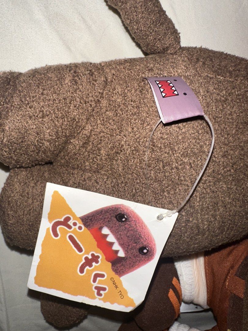 Domo-kun Plush Toy with Tag (Category: Plushies & Soft Toys) located in Pasig City. Submitted by katplush_superlove (Listing ID 1454314243, Image 3). Description: - please check all photos - Cute Domo-kun plush toy - Approximately 6-7 inches tall - Original tags still attached - Perfect for Domo-kun fans - Ideal for display - Fun collectible item.