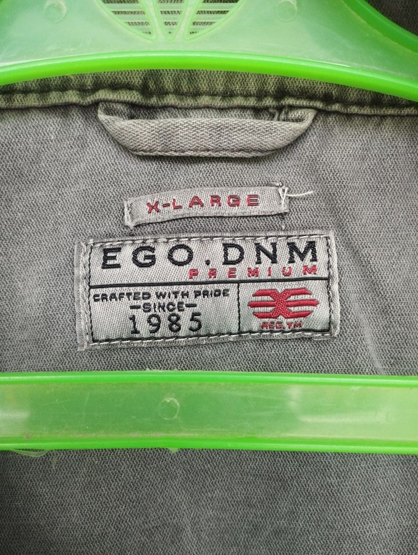 EGO. DNM Grey Washed Denim Jacket X-Large (Category: Coats, Jackets and Outerwear) located in Manila. Submitted by jmz_thrifted (Listing ID 1454320479, Image 3). Description: - Grey washed denim jacket - Brand: EGO.DNM - Size: X-Large (XL) - Classic trucker style - Button closure - Two chest pockets - Two side pockets - Snap button collar closure - Ideal for layering - Made with pride since 1985 EGO Denim Jacket Size XL On Tag Color Rate 9.5/10 G