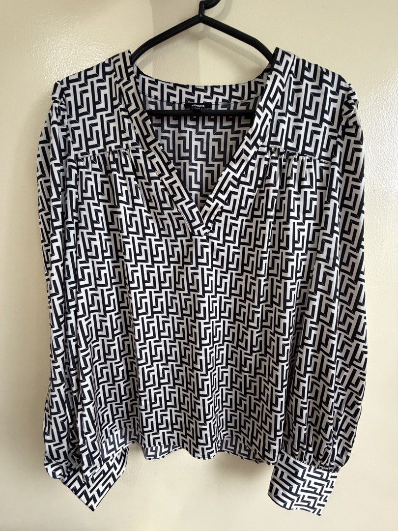 express geometric print long sleeve blouse (Category: Blouses) located in Quezon City. Submitted by buyfromrubyjane (Listing ID 1454192578, Image 1). Description: * lightweight, flowy fabric * flattering v-neckline * long sleeves with button cuffs * relaxed fit * perfect for office wear, smart casual, or everyday styling condition: excellent fits: small (can fit medium depending on preferred fit).