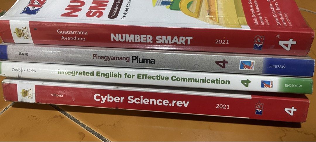 Grade 4 Workbooks: Math, English, Filipino, Science (Category: Textbooks) located in Malabon City. Submitted by charlize.ph (Listing ID 1454198724, Image 1). Description: - Grade 4 workbook bundle - Includes: Number Smart (Math), Pinagyamang Pluma (Filipino), Integrated English, Cyber Science - All are revised editions - Ideal for extra practice or homeschooling needs.