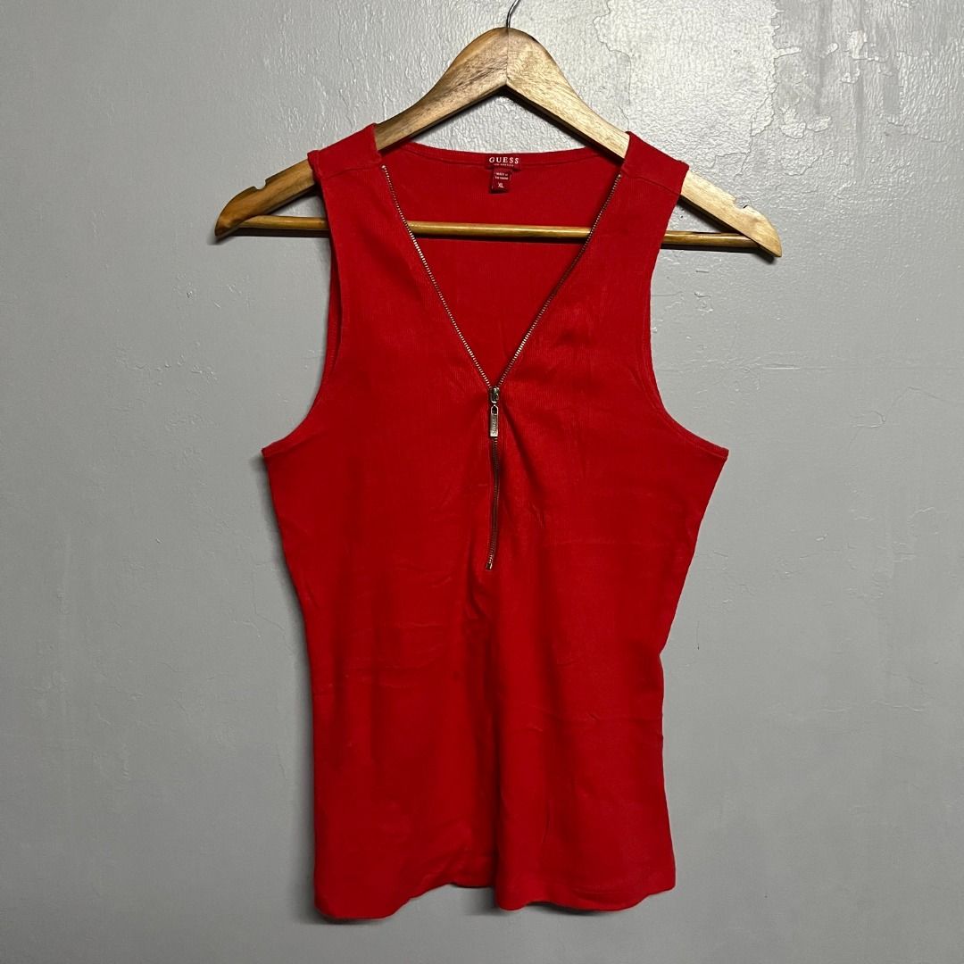 Guess Half Zip Sando Top (Category: Sleeveless) located in Manila. Submitted by yyyyyyves (Listing ID 1454257042, Image 1). Description: Guess Half Zip Sando Top Size XL on tag Fits Large to XL Womens. Good condition, need wash only.