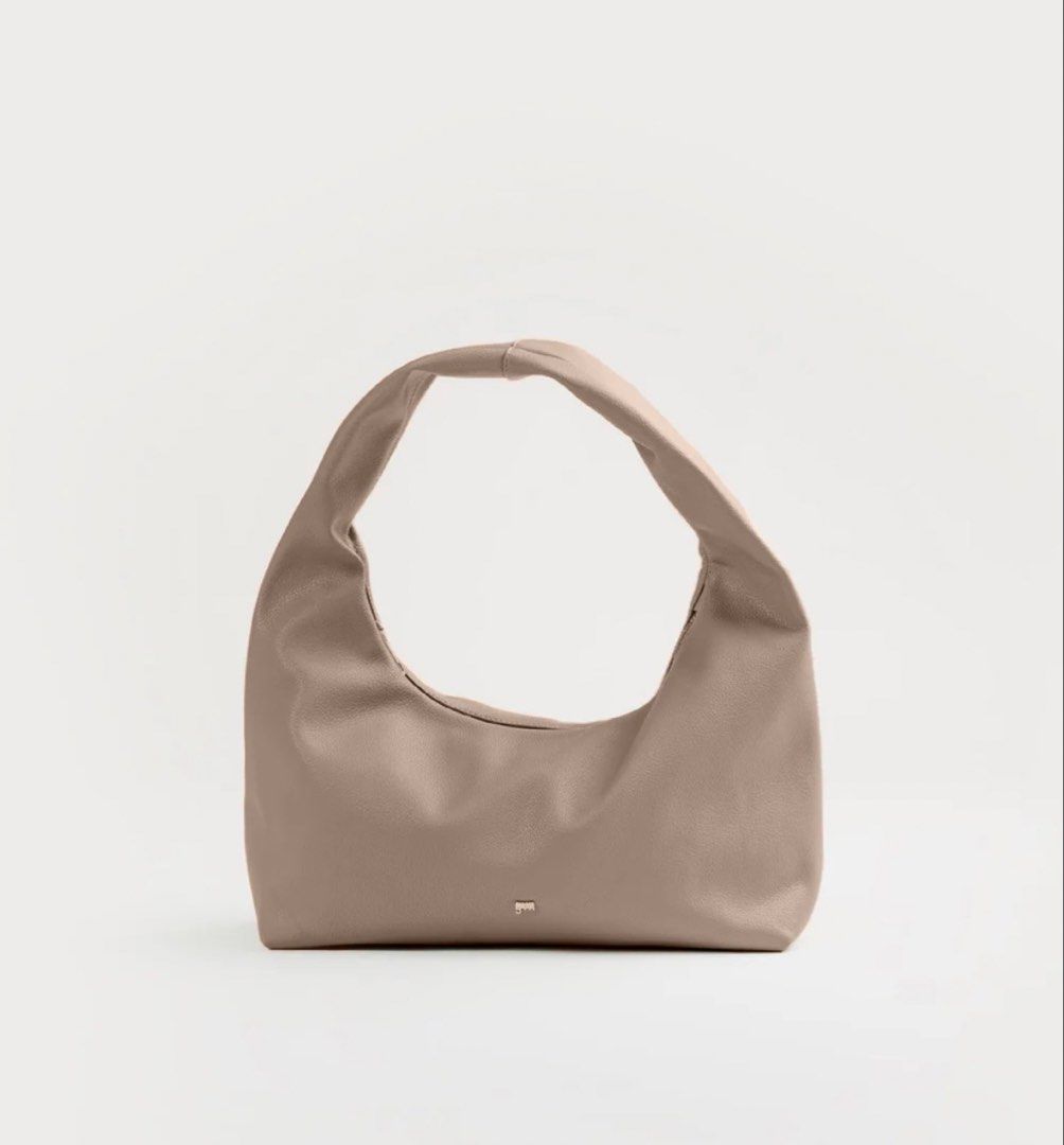 Gvn Medium Taupe Leather Hobo Bag (Category: Shoulder Bags) located in Manila. Submitted by il6_eilsel (Listing ID 1454263953, Image 2). Description: No flaws ! Just needs cleaning on the inside (dm for pictures) Rfs: decluttering Sf must be shouldered by the buyer .
