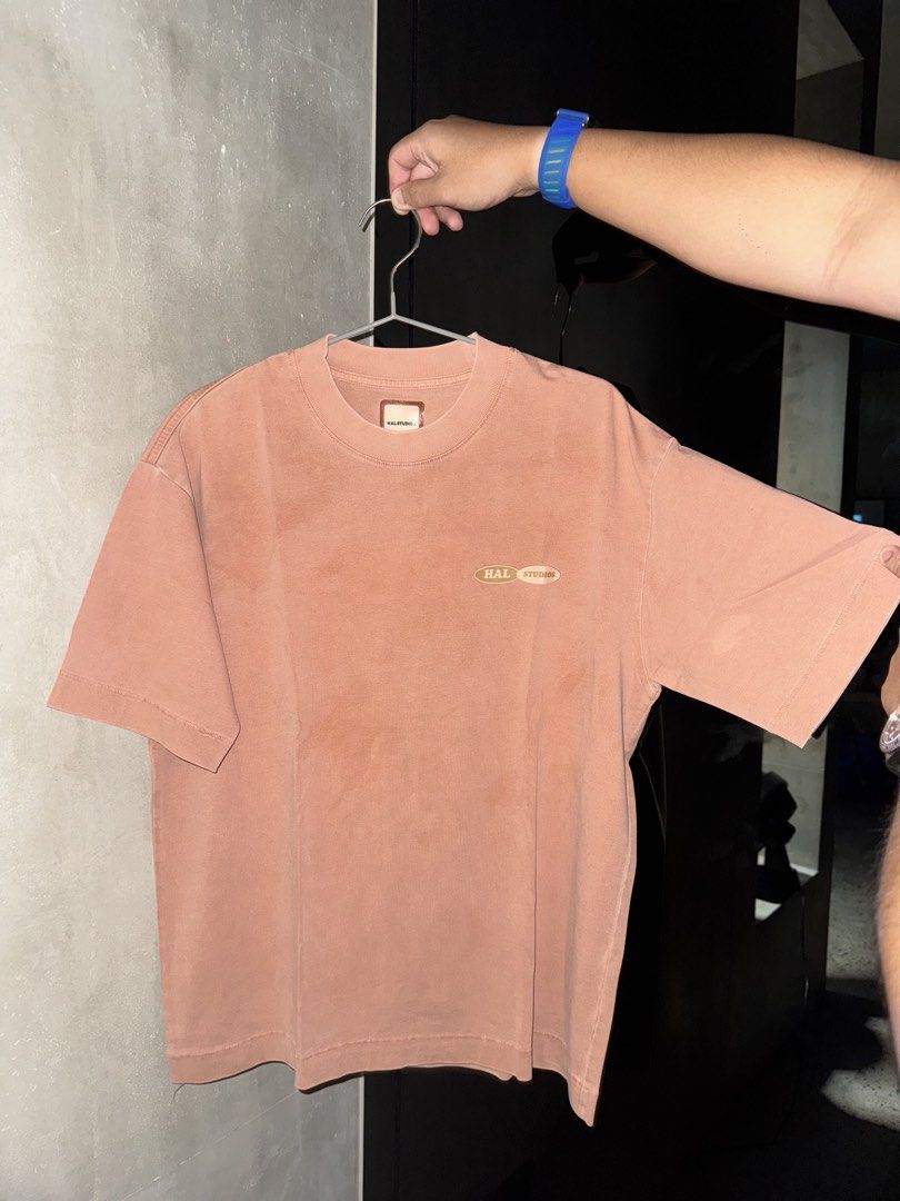 HAL STUDIOS Rap And Bullshit T-Shirt Size S (Category: Luxury Apparel) located in Manila. Submitted by rb.declutters (Listing ID 1454345889, Image 1). Description: - Brand: HAL STUDIOS - Graphic: 'Rap And Bullshit' on back - Color: Dusty Rose / Terracotta - Size: S - Style: Casual wear.