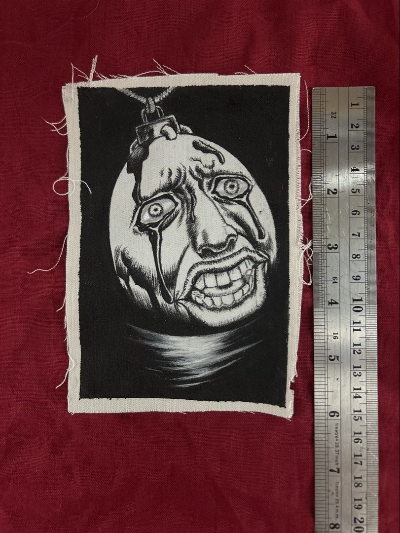 Hand painted patch of Behelit from Berserk (Category: Art & Prints) located in Plaridel. Submitted by eraxer___x___xtain (Listing ID 1454219317, Image 2). Description: •This image features a detailed, hand-drawn black and white textile patch of a Beherit from the Berserk manga series. •Medium is Jacquard Textile Paints .