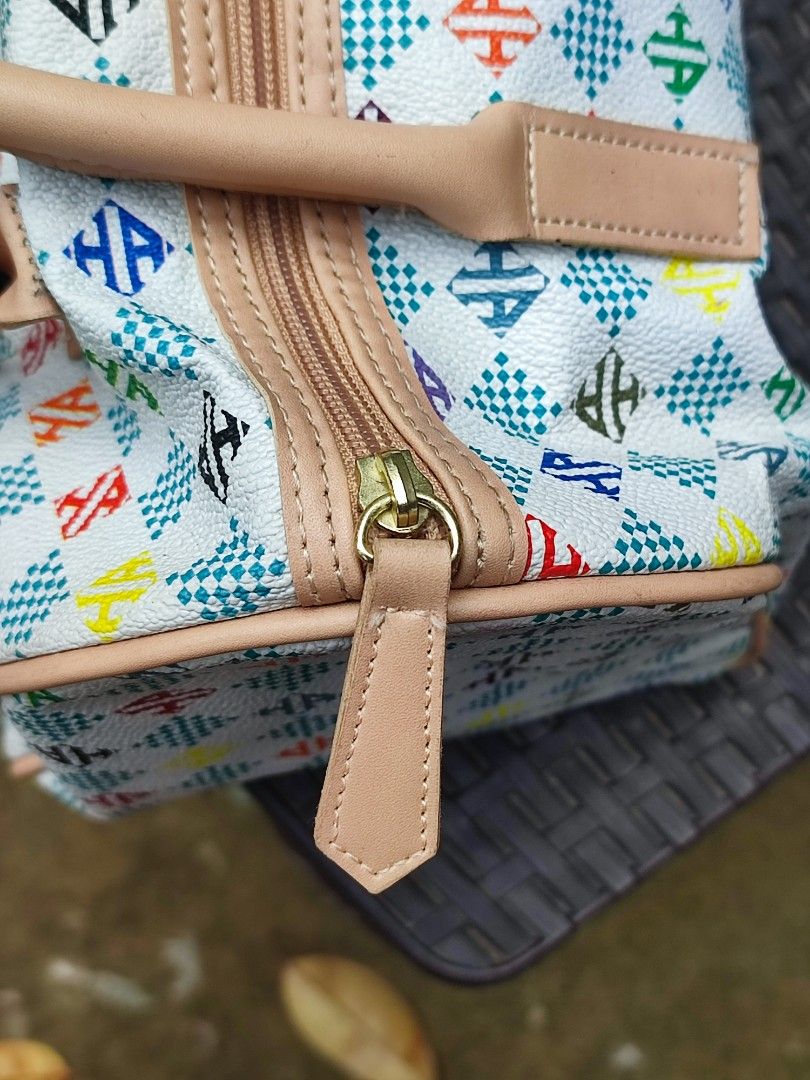 Hardy Amies London Monogram Duffle Bag (Category: Luxury Bags & Wallets) located in Cebu City. Submitted by chimao_dzei (Listing ID 1454197291, Image 3). Description: This is a Hardy Amies London handbag featuring a colorful multi-patterned design and a silver branded shield plaque. 📌The bag is described as lightweight, soft, and suitable for travel or daily use. 📌In perfect condition 📌Very nice in personal✨ 📌Free delivery within Cebu City 📍