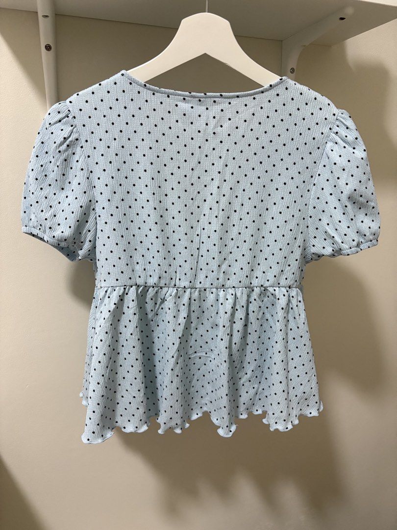 H&M Divided Light Blue Polka Dot Peplum Top Size S (Category: Sleeveless) located in Manila. Submitted by cdc98 (Listing ID 1454351985, Image 2). Description: - Light blue peplum top from H&M Divided - Black polka dot pattern - Short puff sleeves - V-neck wrap-style front - Ruffled hem - Elasticated waist - Ideal for pairing with high-waisted jeans or skirts PLEASE READ ⚠️ • Strictly payment first before ship out • Modes of payment - Gcash, BDO, 