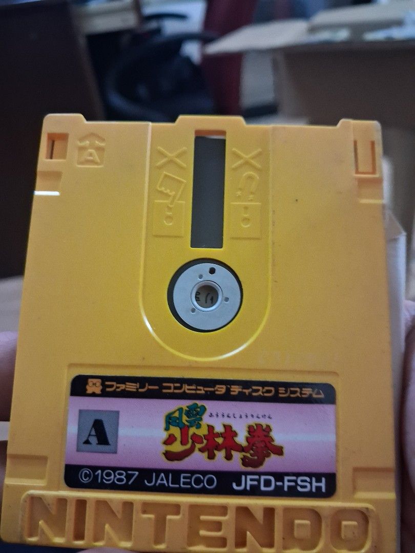 Jaleco Nintendo Family Computer Disk System Game (Category: Nintendo) located in Taguig. Submitted by sonnydela.cruz (Listing ID 1454297015, Image 3). Description: - Jaleco Famicom Disk System Game - Cartridge Color: Yellow - Game Code: JFD-FSH - Copyright: 1987 - **Requires Famicom Disk System Adapter** - Please check photos for exact condition..