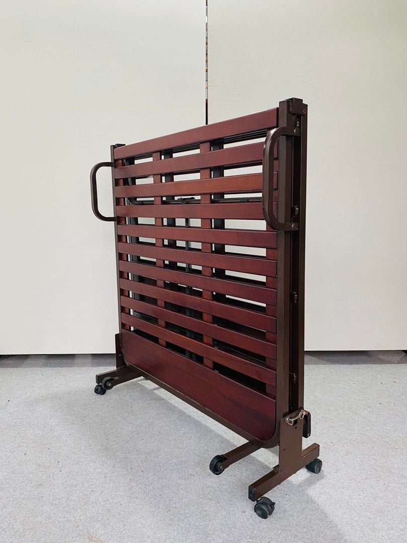 “JAPAN SURPLUS” FOLDING SINGLE BEDFRAME (Category: Bed Frames & Mattresses) located in Bulacan. Submitted by monmon555 (Listing ID 1454307859, Image 2). Description: “JAPAN SURPLUS” FOLDING SINGLE BEDFRAME SIZE: 79L” x 42W” 12H” inches (AS-IS ITEM) IN GOOD CONDITION.