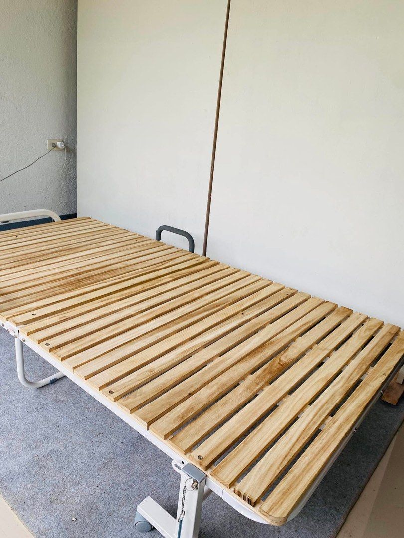 “JAPAN SURPLUS” FOLDING SINGLE BEDFRAME (Category: Bed Frames & Mattresses) located in Bulacan. Submitted by monmon555 (Listing ID 1454308530, Image 3). Description: “JAPAN SURPLUS” FOLDING SINGLE BEDFRAME SIZE: 79L” x 42W” 12H” inches (AS-IS ITEM) IN GOOD CONDITION.
