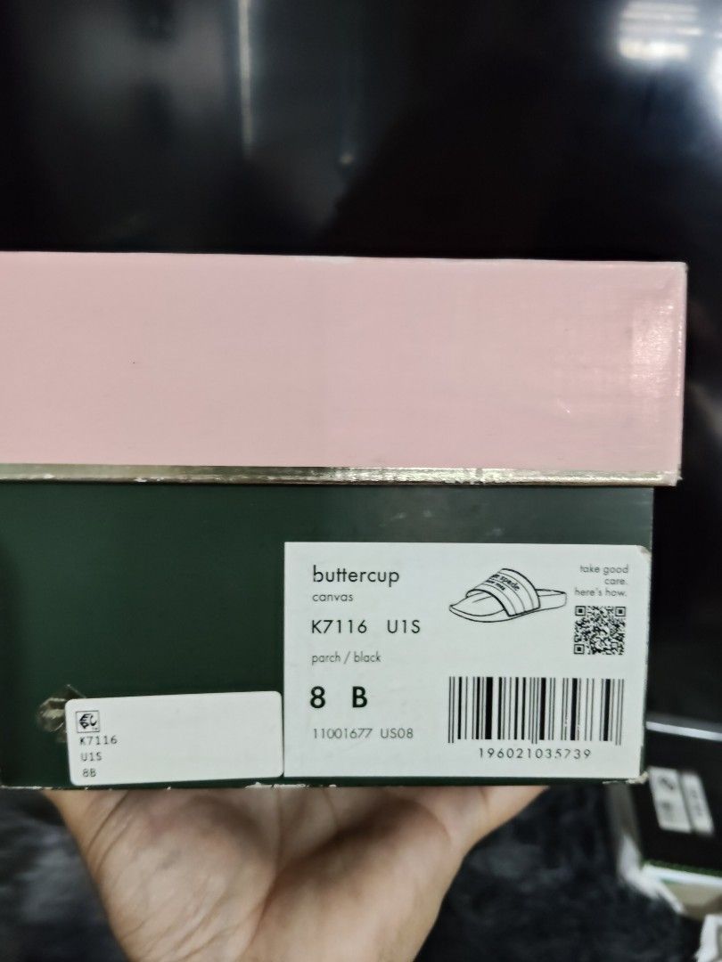 Kate Spade New York Slides (Category: Slippers and slides) located in Iba. Submitted by royalgemini (Listing ID 1453863025, Image 2). Description: - Brand: Kate Spade New York - Color: Black - Feature: Brand name on straps - Includes: Original box and tissue paper - Ideal for: Casual wear.