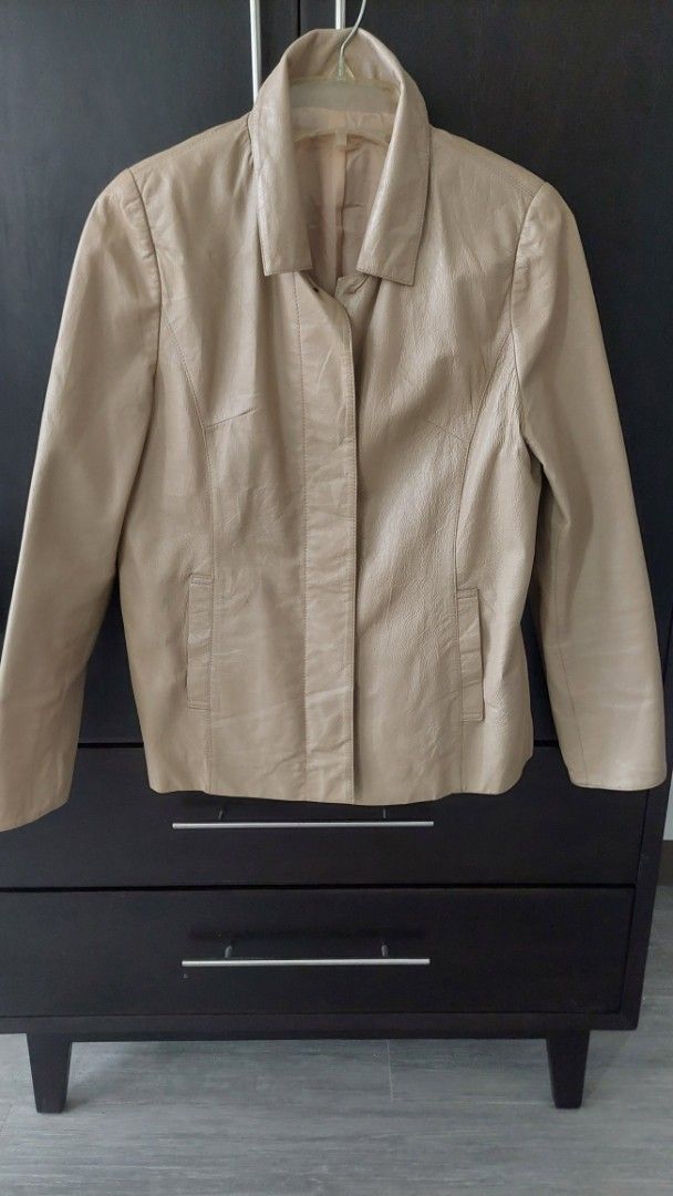 KIOFIX Beige Leather Jacket Made in Korea (Category: Coats, Jackets and Outerwear) located in Paranaque City. Submitted by daddyu (Listing ID 1454220629, Image 1). Description: Vintage Beige leather jacket - Brand: KIOFIX - Made in Korea - Size: Free (fits most) - Lining color: Light pinkish - Ideal for everyday wear - Reason for selling: No longer needed.