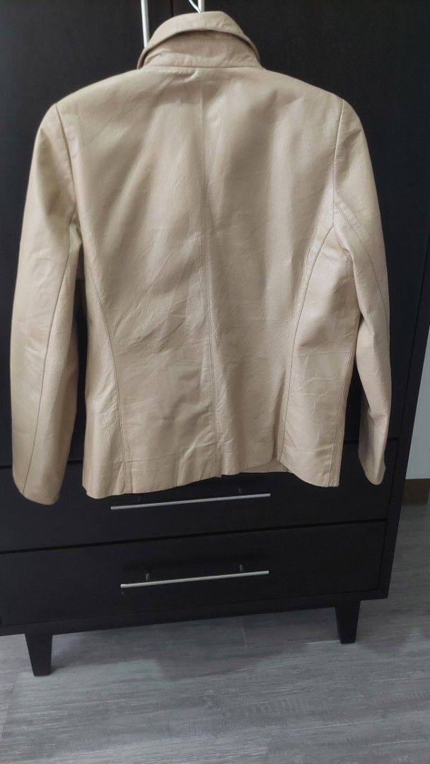KIOFIX Beige Leather Jacket Made in Korea (Category: Coats, Jackets and Outerwear) located in Paranaque City. Submitted by daddyu (Listing ID 1454220629, Image 2). Description: Vintage Beige leather jacket - Brand: KIOFIX - Made in Korea - Size: Free (fits most) - Lining color: Light pinkish - Ideal for everyday wear - Reason for selling: No longer needed.