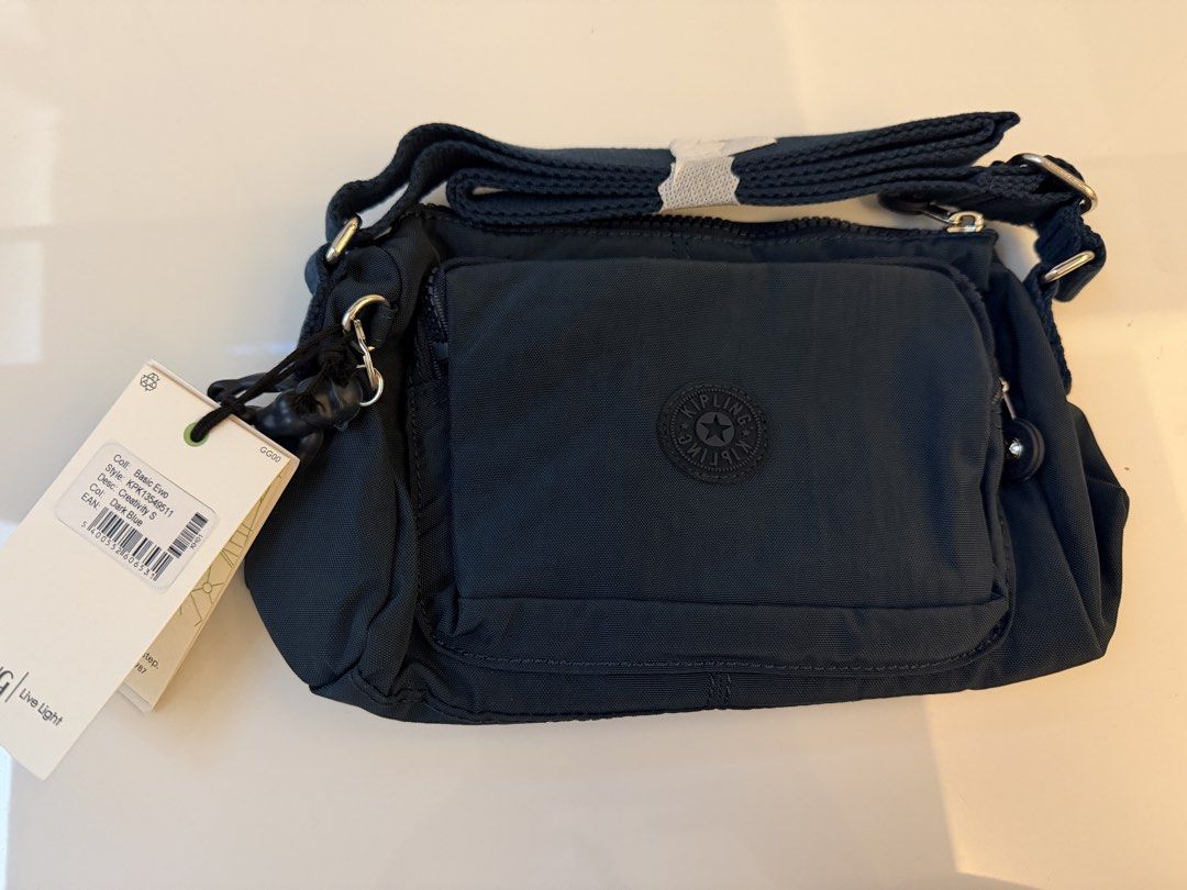 Kipling Sling Basic Small (Category: Cross-body Bags) located in Singapore. Submitted by pumpkinpopcorn (Listing ID 1454315895, Image 1). Description: Brand new with tag Free Coin Pouch Self collect only .