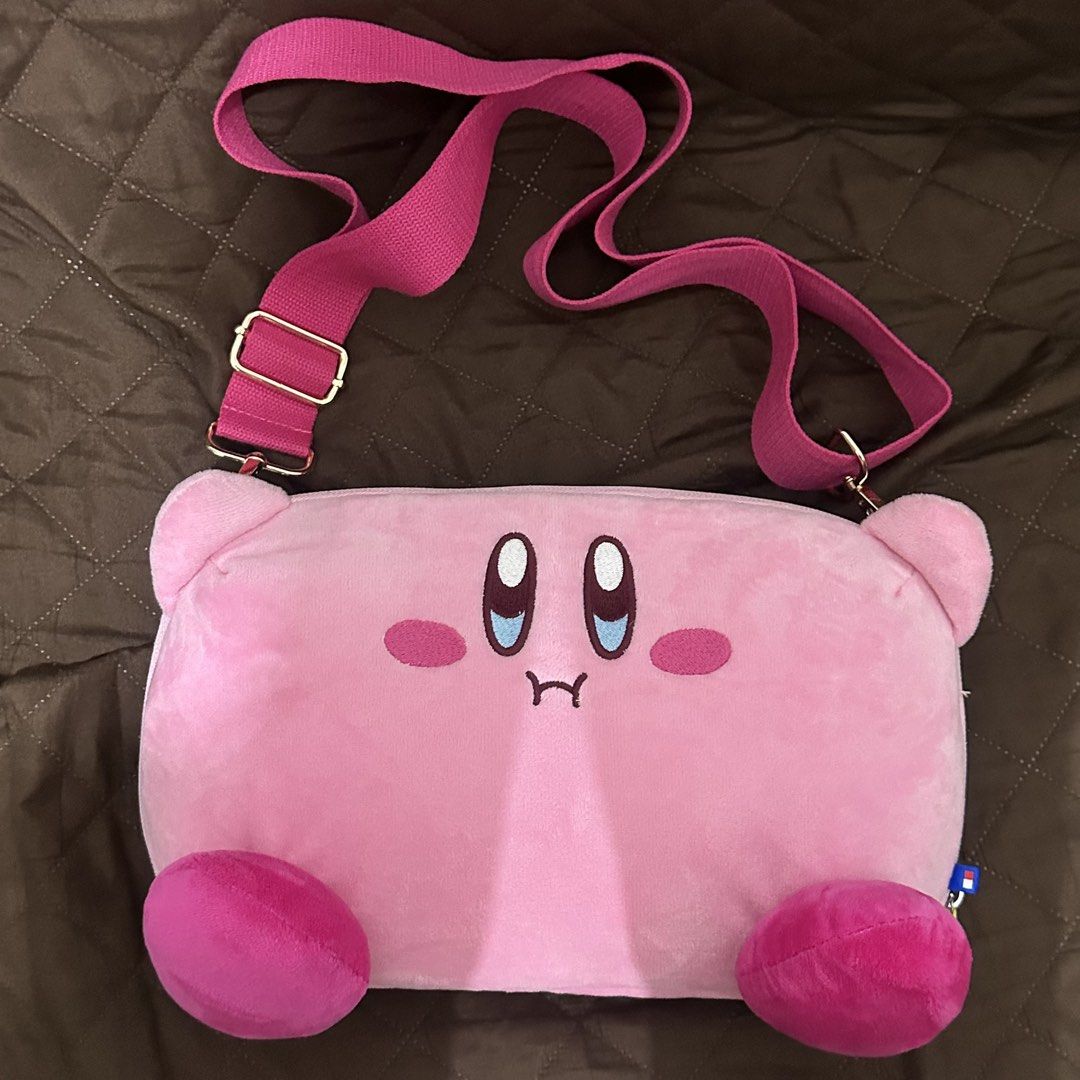 Kirby Plush Pouch for Nintendo Switch 2 (HORI) (Category: Cross-body Bags) located in Quezon City. Submitted by samgyupsalamaw (Listing ID 1454286839, Image 1). Description: Brand new & bought from Datablitz. With pink free strap included. (The pouch itself doesn’t have its own strap kasi kaya I bought the strap separately) Orig price of this is ₱1895. Rfs: Declutter Loc: Crame, QC MOD: J&T/Lalamove MOP: Gcash/Maribank.