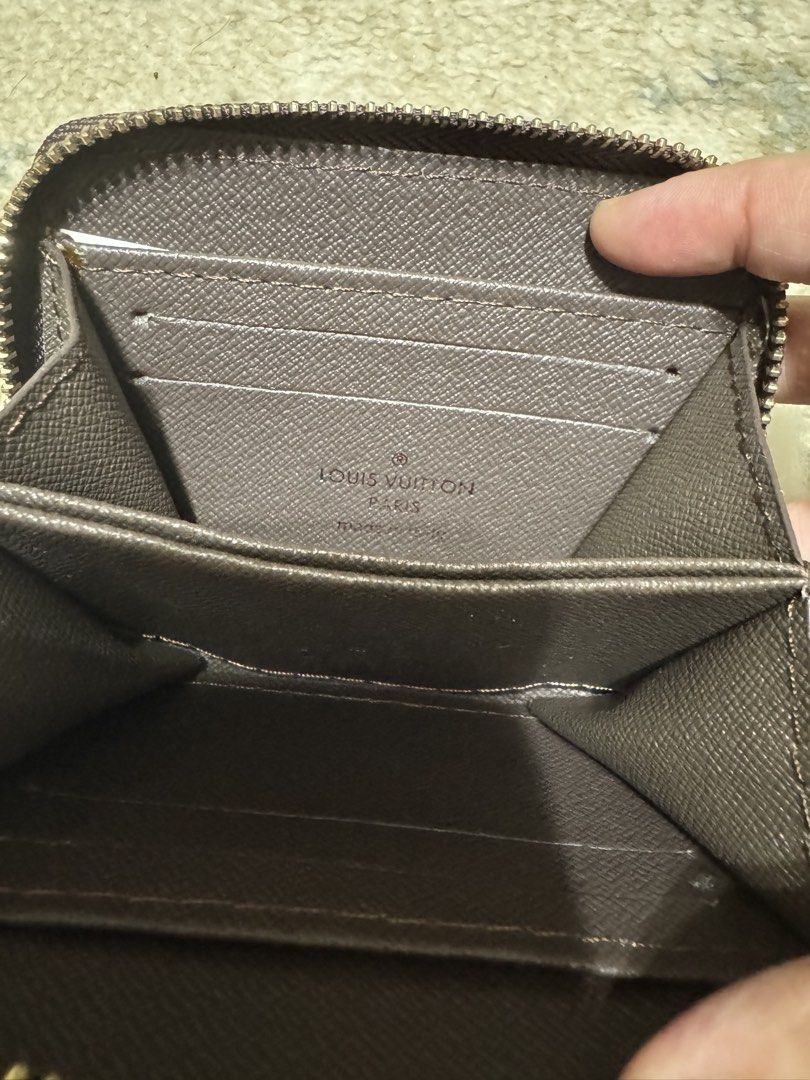 Louis Vuitton Damier Ebene Coin Purse (Category: Luxury Bags & Wallets) located in Manila. Submitted by milleshoppppp (Listing ID 1454306441, Image 3). Description: - Secure zipper closure - Interior features card slots and a main compartment - Never been used.