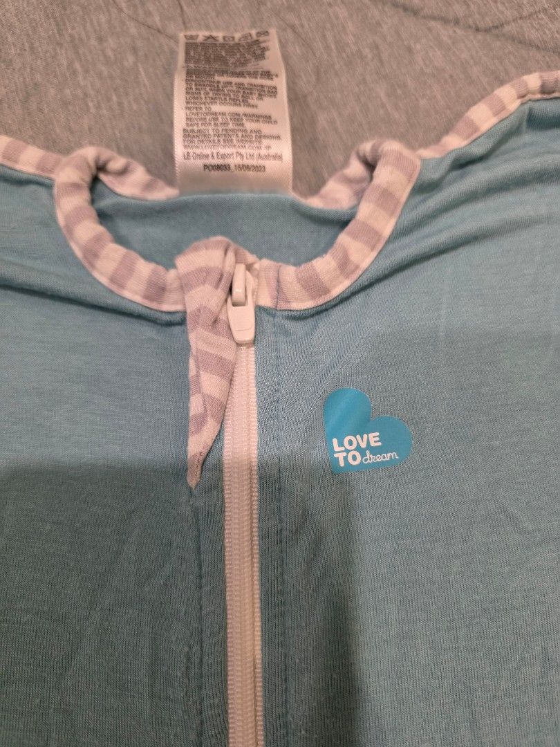Love To Dream Swaddle Up Small (Category: Babies & Kids Fashion) located in Paranaque City. Submitted by materesi (Listing ID 1454361992, Image 3). Description: - Love To Dream Swaddle Up - Color: Blue - Size: Small (fits 3.5-6 kgs) - Material: 95% Viscose, 5% Elastane - Ideal for: Moderate weather - Features: Zipper closure for easy diaper changes - Origin: Designed in Australia, Made in China.