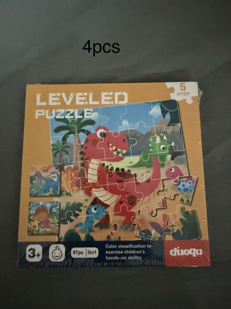 Magnetic Puzzles for Kids (3+ Years) (Category: Board Games & Puzzles) located in Paranaque City. Submitted by bratty.20 (Listing ID 1454196886, Image 3). Description: - Set of 5 Duoqu Leveled Puzzles - Ideal for ages 3 and up - Helps develop children's hands-on ability - Enhances color classification skills - Each puzzle is shrink-wrapped and sealed - Features various themes: Little Red Riding Hood, animals, and dinosaurs.