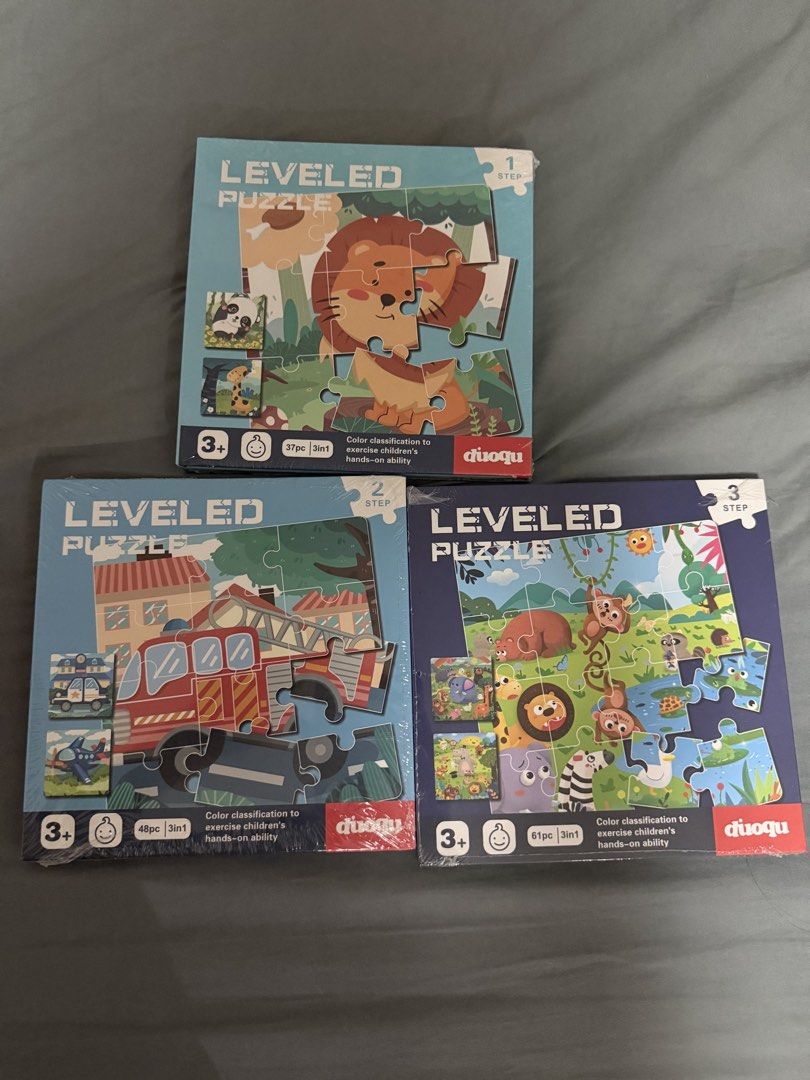 Magnetic Puzzles for Kids (3+ Years) (Category: Board Games & Puzzles) located in Paranaque City. Submitted by bratty.20 (Listing ID 1454196886, Image 2). Description: - Set of 5 Duoqu Leveled Puzzles - Ideal for ages 3 and up - Helps develop children's hands-on ability - Enhances color classification skills - Each puzzle is shrink-wrapped and sealed - Features various themes: Little Red Riding Hood, animals, and dinosaurs.