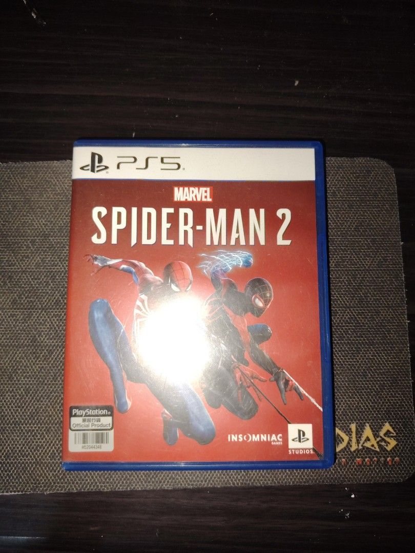Marvel's Spider-Man 2 PS5 Game (Category: PlayStation) located in Manila. Submitted by rellekeane (Listing ID 1454227951, Image 1). Description: - Marvel's Spider-Man 2 for PlayStation 5 - Original story featuring Peter Parker and Miles Morales - Explore a vibrant New York City - Includes game disc and case.