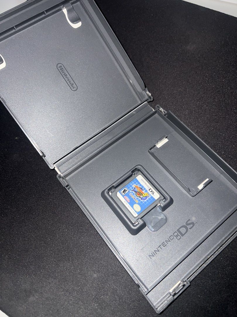 Mega Man Battle Network 5 Double Team DS Game (Category: Nintendo) located in Quezon City. Submitted by inigodiago (Listing ID 1454287045, Image 2). Description: - Includes game cartridge and original case.