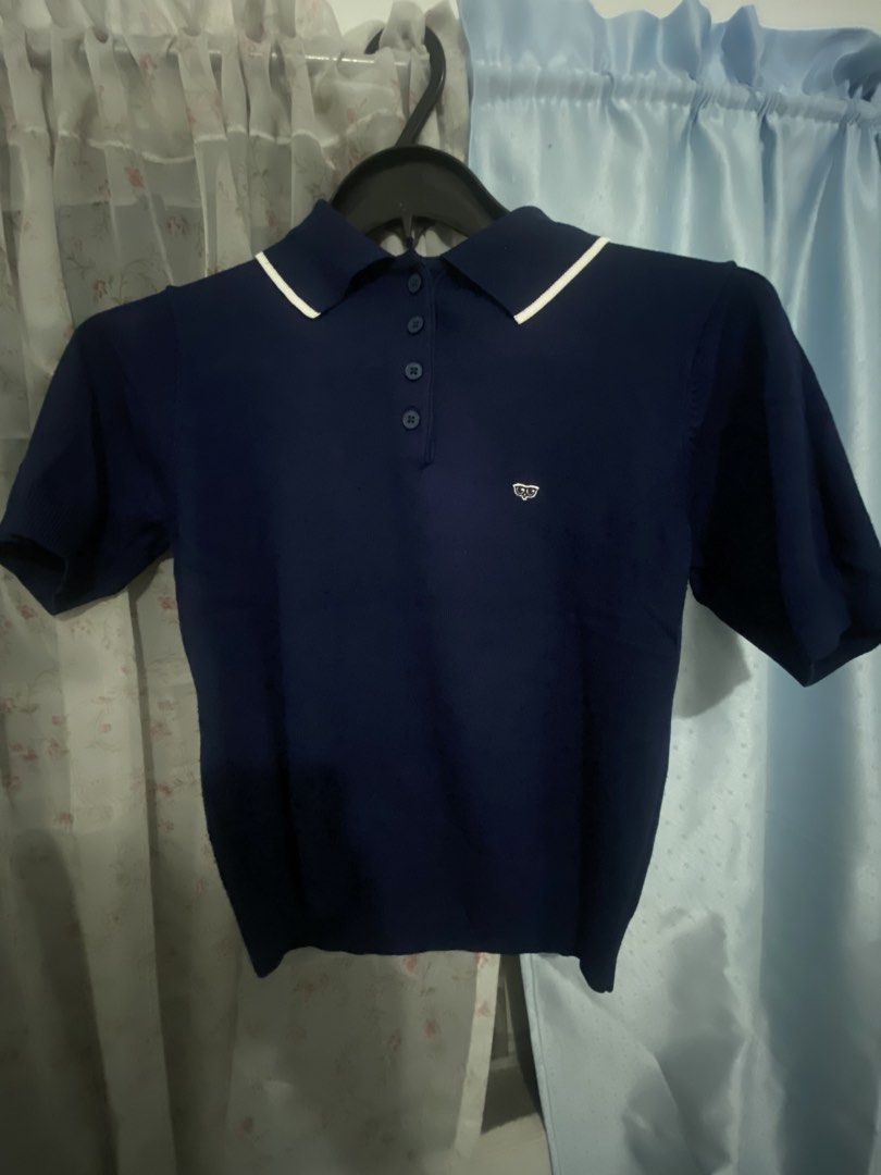 MEMO Navy Blue Collared Polo Shirt Size S (Category: Blouses) located in Lapu Lapu. Submitted by ahippo (Listing ID 1454359956, Image 1). Description: - Navy blue MEMO polo shirt - Short sleeves with white collar trim - Button-up front - Small embroidered logo on chest - Classic and simple design, perfect for casual wear.