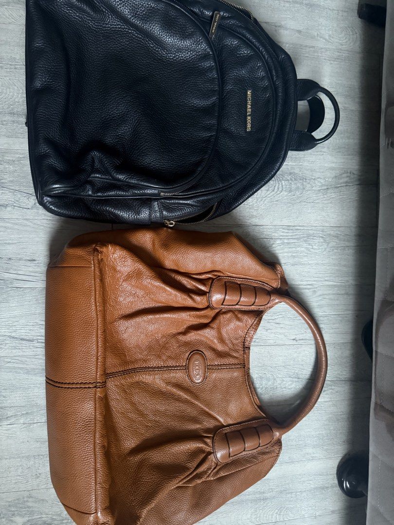 Michael Kors large leather backpack (Category: Backpacks) located in Antipolo. Submitted by 2003preloved (Listing ID 1454201638, Image 3). Description: Authentic Michael Kors black pebbled leather backpack with gold-tone hardware. Spacious and lightweight, perfect for work, travel, or everyday use. In good pre-loved condition with normal signs of use. Clean interior and all zippers are working. .