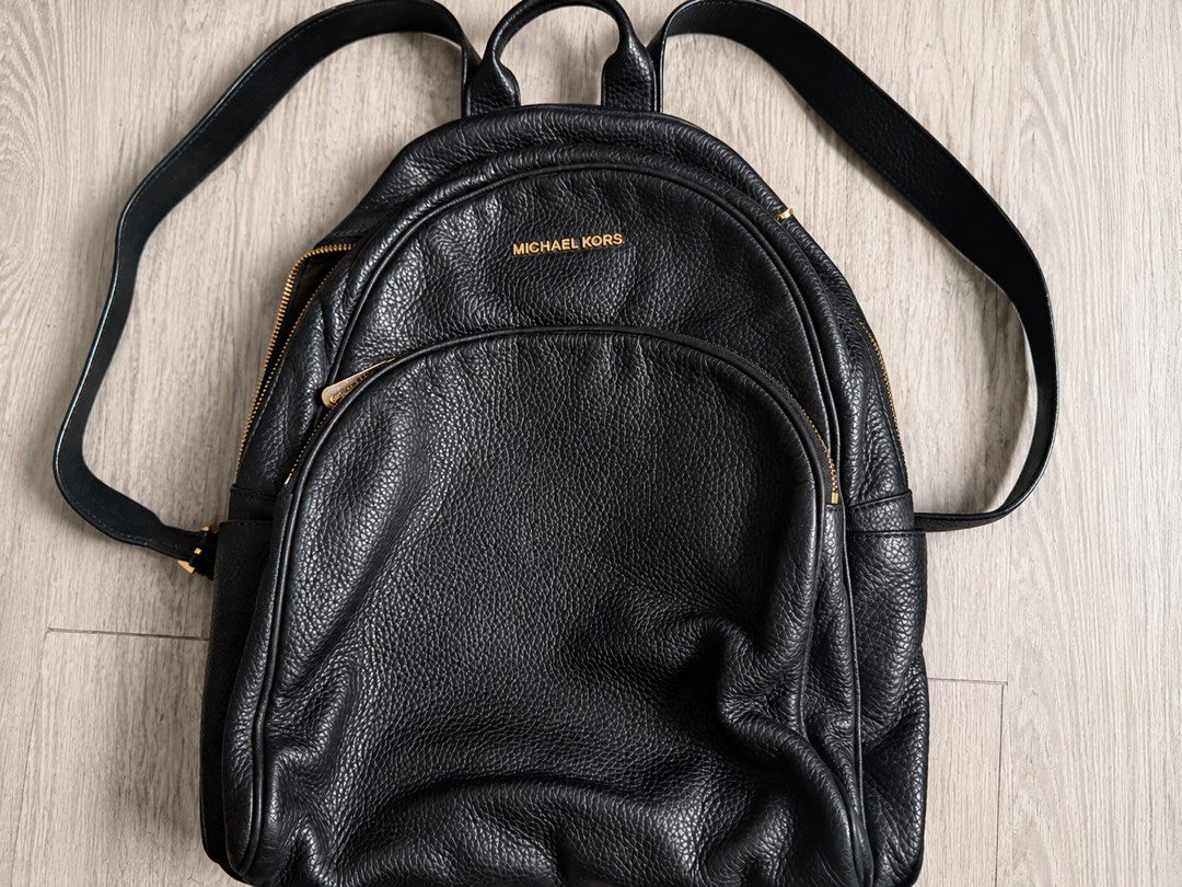 Michael Kors large leather backpack (Category: Backpacks) located in Antipolo. Submitted by 2003preloved (Listing ID 1454201638, Image 1). Description: Authentic Michael Kors black pebbled leather backpack with gold-tone hardware. Spacious and lightweight, perfect for work, travel, or everyday use. In good pre-loved condition with normal signs of use. Clean interior and all zippers are working. .