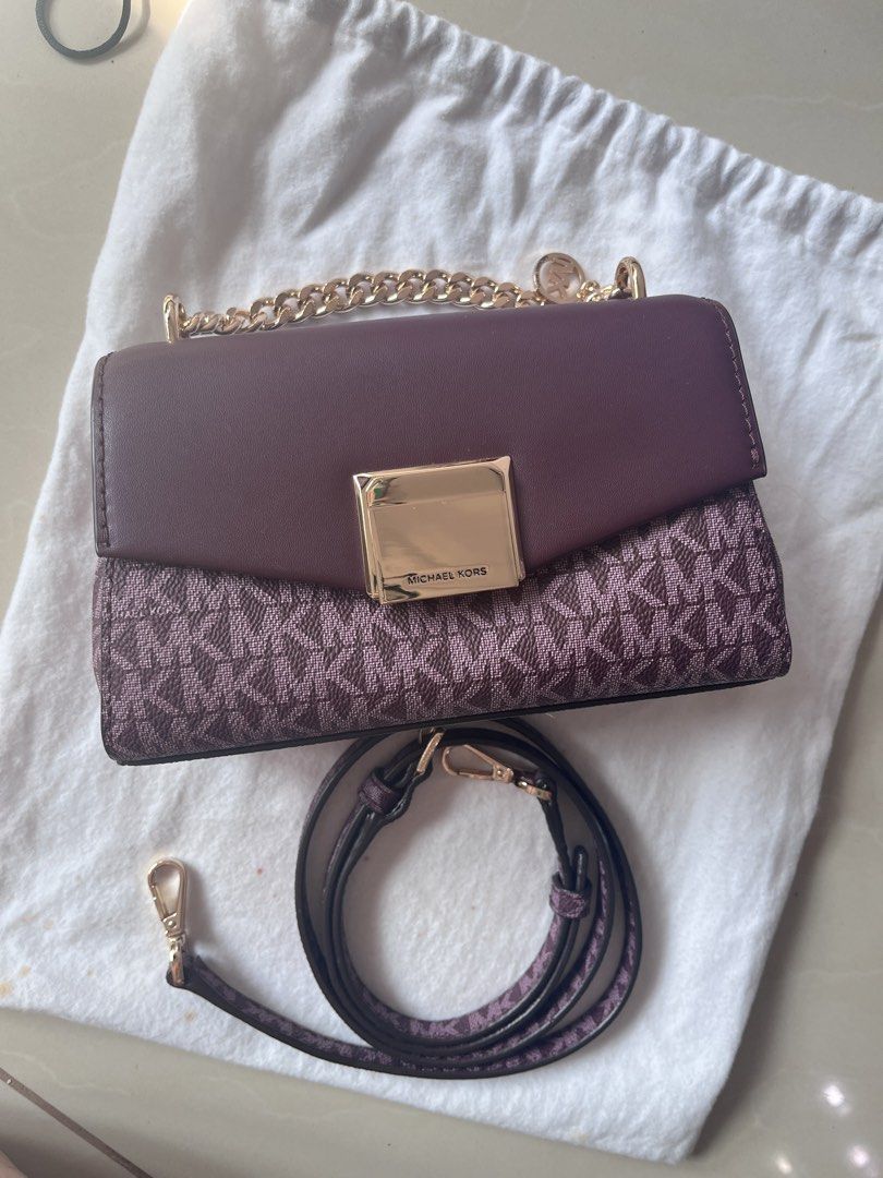 Michael Kors Monogram Chain Shoulder Bag (Category: Luxury Bags & Wallets) located in Makati City. Submitted by shoplin (Listing ID 1454222347, Image 2). Description: Brand New (never been use) Authentic Michael Kors Small Lita bag Location: Makati No flaws. Gcash payment first basis Selling low. J&T/ Lalamove ready - Authentic Michael Kors bag - Signature MK monogram pattern - Rich burgundy leather accents - Elegant gold chain strap and hardware