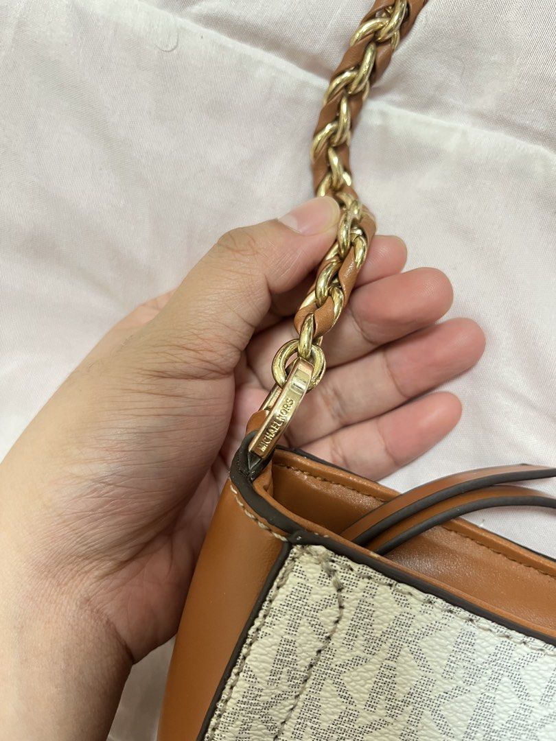 Michael Kors Monogram Carmen Pouchette (Category: Luxury Bags & Wallets) located in San Fernando. Submitted by luckychloever (Listing ID 1454350470, Image 3). Description: - Signature MK monogram print on white canvas - Tan leather trim and strap - Stylish gold chain detail - For self authentication - Negotiable .