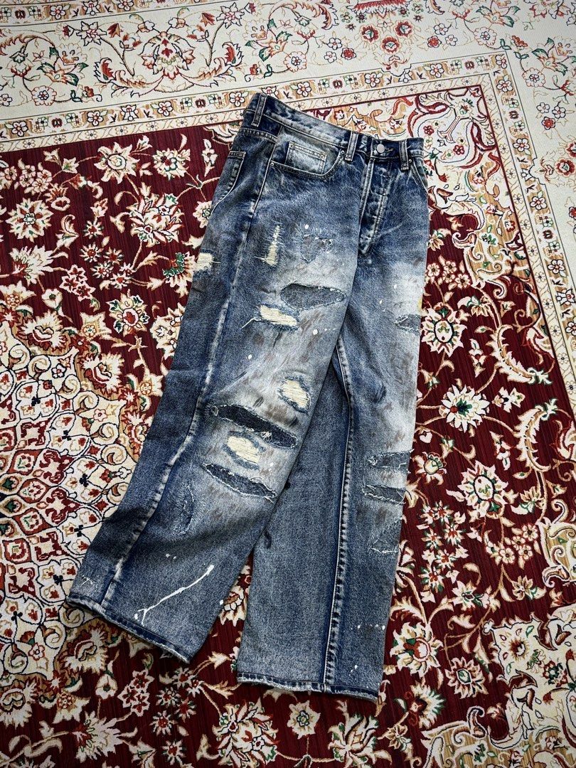 MNML Ultra Baggy Distressed Jeans (Category: Jeans) located in San Juan, La Union. Submitted by bornunderground.ph (Listing ID 1454246812, Image 1). Description: MNML Ultra Baggy Distressed Jeans Authentic/ Like New Sale @ ₱2,495 Plus Shipping - It delivers a heavily customized, vintage streetwear aesthetic. Size: 30 (Model Height 5”7) Silhouette: Cut in an ultra-baggy, wide-leg straight fit that pools casually over sneakers. Heavy Destruction: F