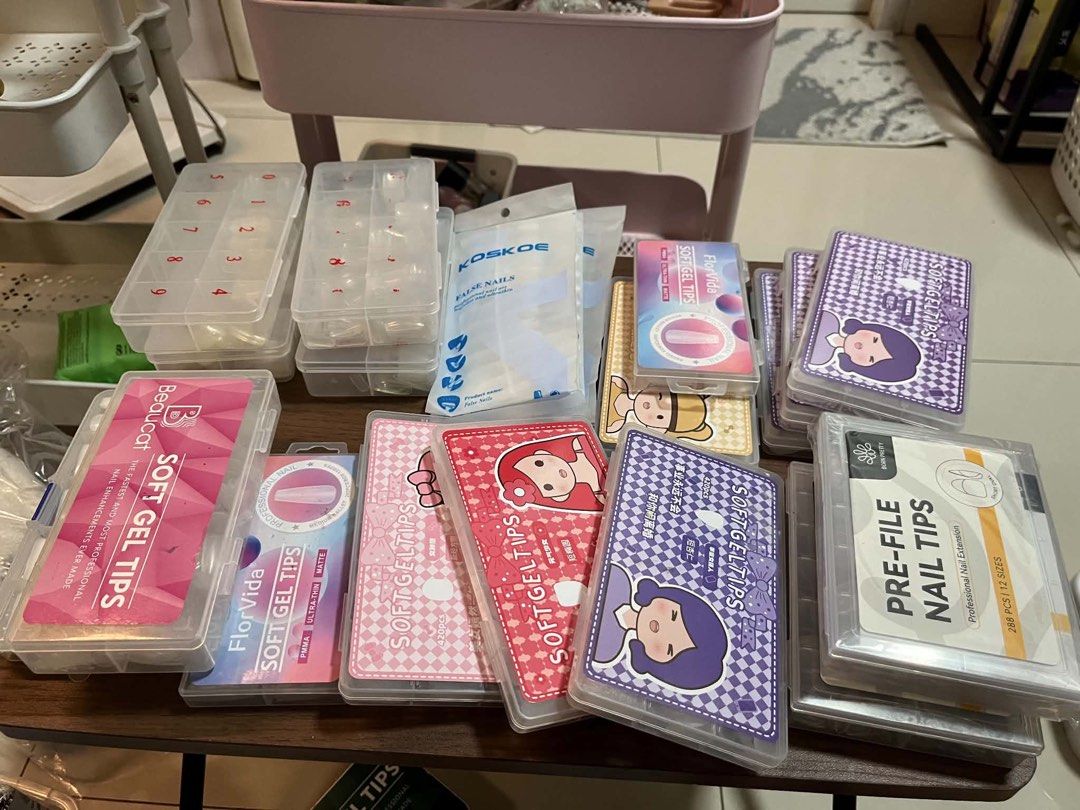 Nail Set (Category: Hands & Nails) located in Quezon. Submitted by gguevarra265927 (Listing ID 1454274760, Image 3). Description: - Comprehensive nail art collection - Features a wide array of gel polish colors - Includes various nail tips (soft gel, pre-file) - Comes with an assortment of nail decorations: glitters, rhinestones, charms (including cute bear designs) - Complete set of nail tools: clippers, files, brushes, cuticle pushers - Include