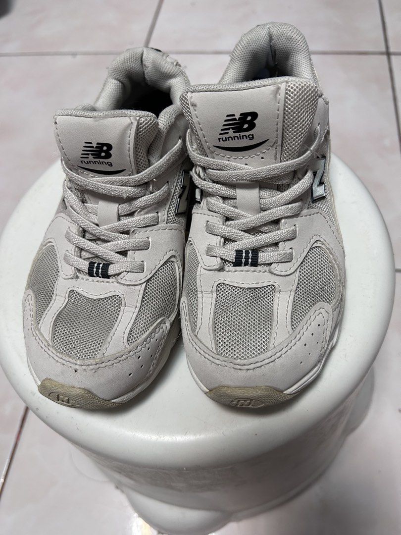 New Balance Running Shoes (Category: Babies & Kids Fashion) located in General Trias. Submitted by theosdeclutter (Listing ID 1454297073, Image 1). Description: - Grey New Balance running shoes - Mesh and synthetic upper - Lace-up closure - Suitable for everyday wear or light jogs.