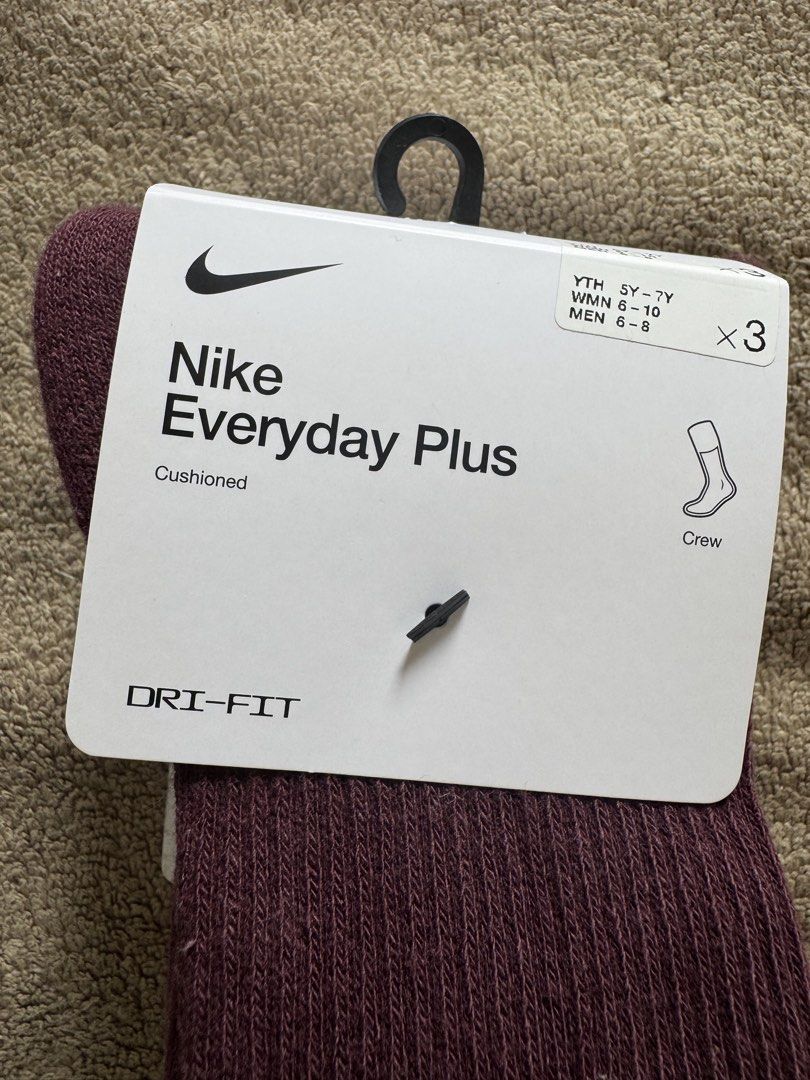 Nike Everyday Plus Crew Socks (3 Pairs) (Category: Socks) located in Davao. Submitted by ann8835 (Listing ID 1454241048, Image 3). Description: - 3 pairs of Nike Everyday Plus Crew Socks - Features cushioning for comfort - Dri-Fit technology to keep feet dry - Available colors: Burgundy, Light Blue, Beige - Crew length, ideal for everyday use.