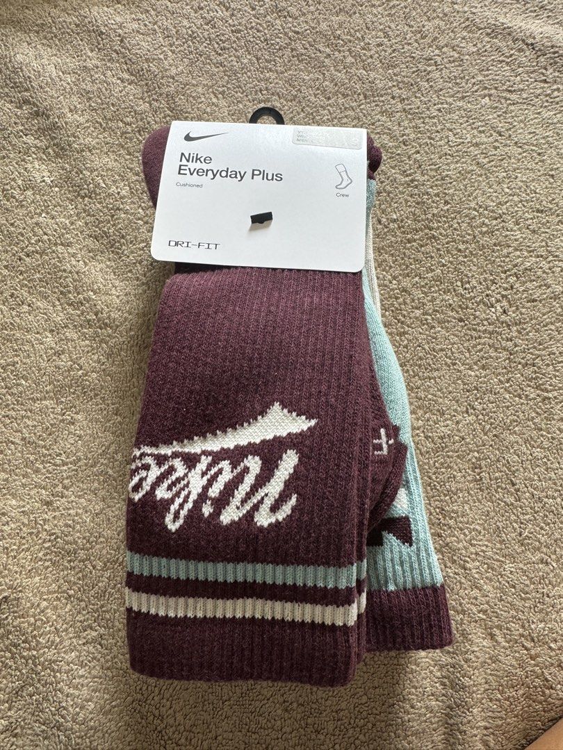 Nike Everyday Plus Crew Socks (3 Pairs) (Category: Socks) located in Davao. Submitted by ann8835 (Listing ID 1454241048, Image 1). Description: - 3 pairs of Nike Everyday Plus Crew Socks - Features cushioning for comfort - Dri-Fit technology to keep feet dry - Available colors: Burgundy, Light Blue, Beige - Crew length, ideal for everyday use.