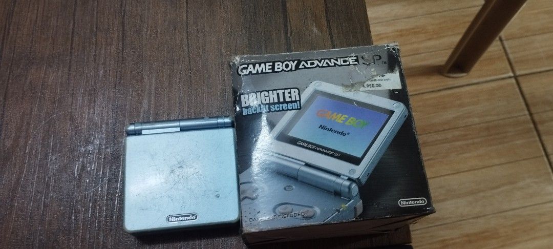 Nintendo GBA SP model 101 (Category: Nintendo) located in Taguig. Submitted by sonnydela.cruz (Listing ID 1454300862, Image 2). Description: Nintendo GBA SP model 101 with box and manuals free cartridges .